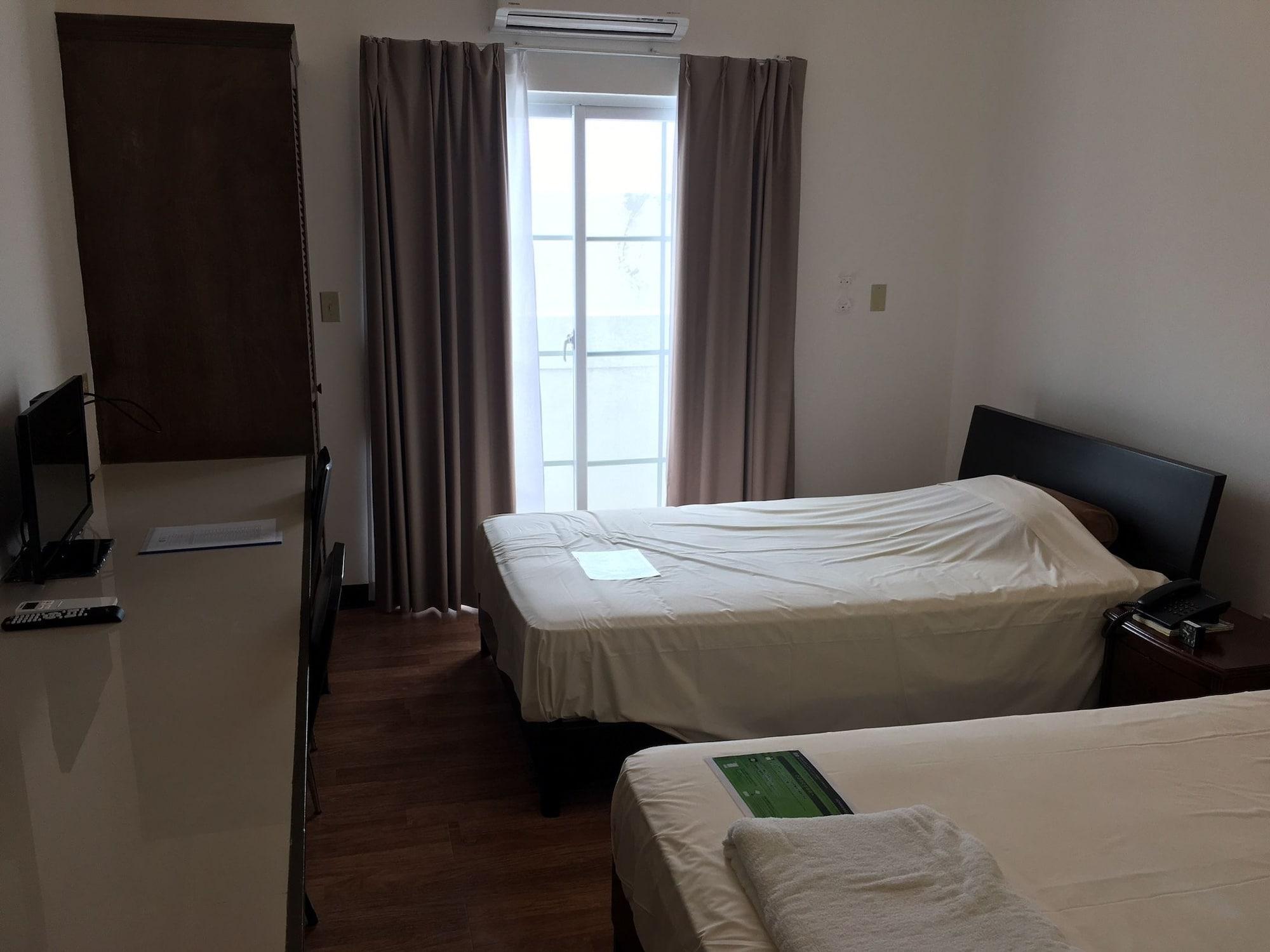 Himawari Hotel Гарапан Екстериор снимка