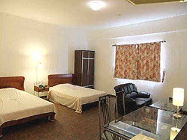 Himawari Hotel Гарапан Стая снимка